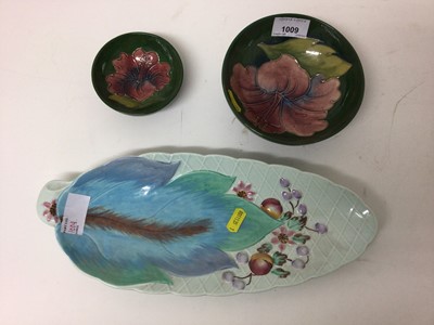 Lot 1009 - Two Moorcroft bowls and a Clarice Cliff leaf-shaped dish (3)