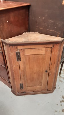 Lot 1108 - Antique corner cupboard with shaped shelves enclosed by panelled door, with H shape hinges, 76cm wide, 91cm high