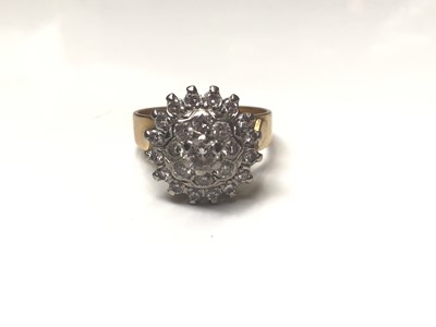 Lot 14 - Diamond cluster ring with twenty five brilliant cut diamonds in tiered claw setting on shank stamped 18ct