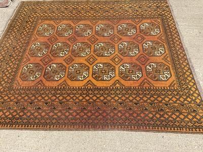 Lot 1203 - Large Afghan rug together with a small rug