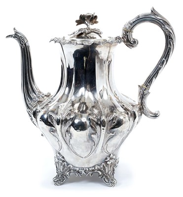 Lot 265 - Victorian silver teapot of shaped baluster form, with engraved armorial, hinged domed cover