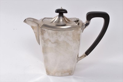 Lot 267 - 1930s silver coffee pot of tapering rectangular form, with hinged fluted cover and ebony handle