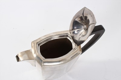 Lot 267 - 1930s silver coffee pot of tapering rectangular form, with hinged fluted cover and ebony handle