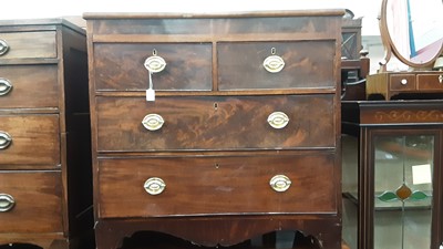 Lot 1110 - 19th century mahogany chest of two short and two long drawers with oval brass handles, on bracket feet