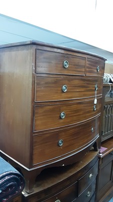 Lot 1112 - 19th century mahogany bow front chest of two short and three long drawers with brass ring handles, on bracket feet