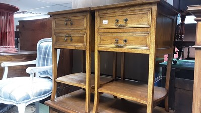 Lot 1115 - Pair of good quality oak bedside chests with two drawers above shaped tiers below