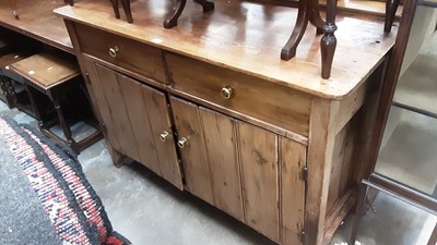 Lot 1117 - Victorian pine dresser base with two drawers above two cupboards below, on block feet