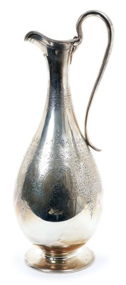Lot 271 - Victorian silver jug of baluster form, with engraved floral and foliate decoration