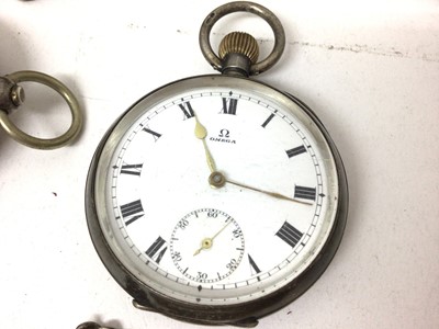 Lot 63 - Omega silver pocket watch, Victorian silver full hunter pocket watch, two silver watch chains, one other chain with silver vesta fob, plus various coins within a vintage tin