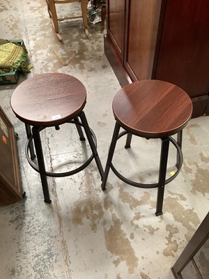 Lot 1125 - Pair of modern adjustable bar stools with circular wooden tops on metal bases