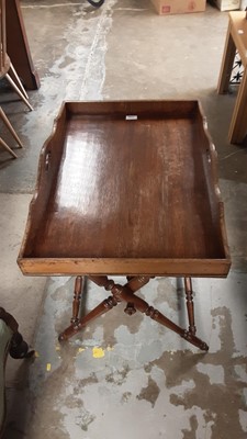 Lot 1126 - Edwardian oak butlers tray on folding stand