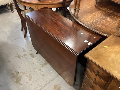 Lot 1134 - 19th century mahogany drop-flap dining table on ring turned legs