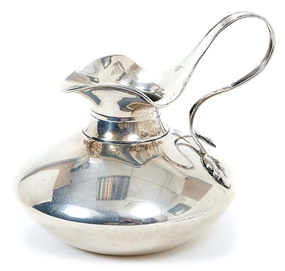 Lot 280 - Edwardian Art Deco style silver cream jug of compressed circular form