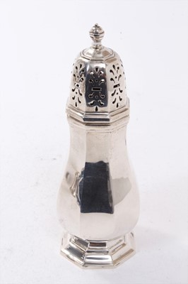 Lot 281 - 1930s silver sugar caster of octagonal form with slip pierced cover on a stepped octagonal base