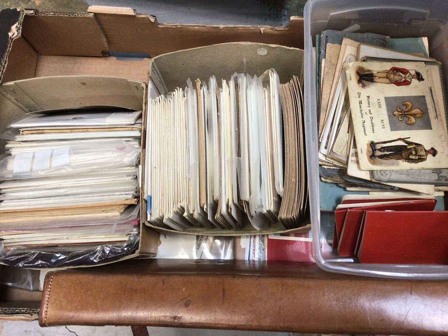 Lot 55 - Five boxes of miscellaneous items, including militaria, postcards, police-related items, etc