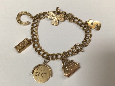 Lot 906 - 9ct gold charm bracelet