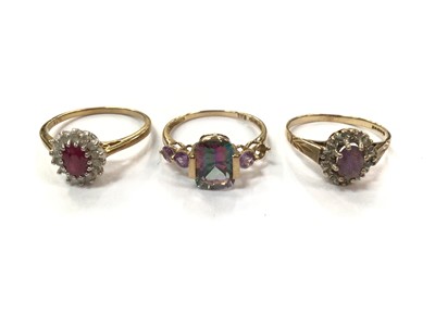 Lot 932 - Three 9ct gold multi gem set dress rings