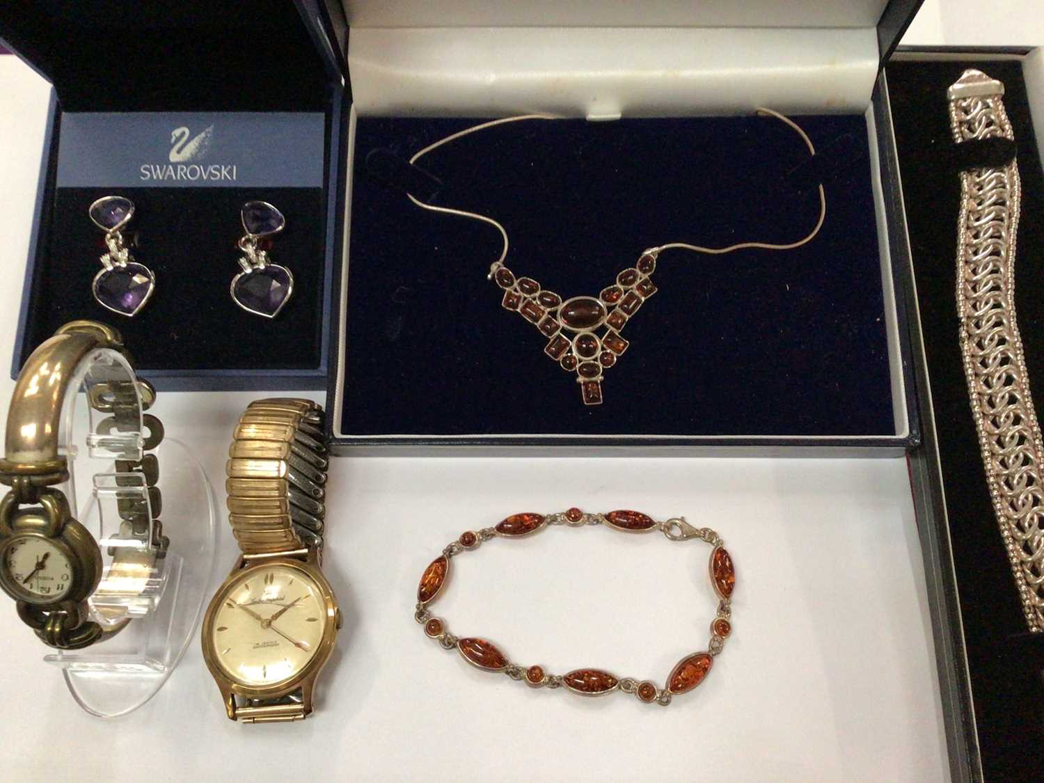 Lot 934 - Silver bracelet, silver and amber necklace and bracelet, pair Swarovski earrings and two wristwatches
