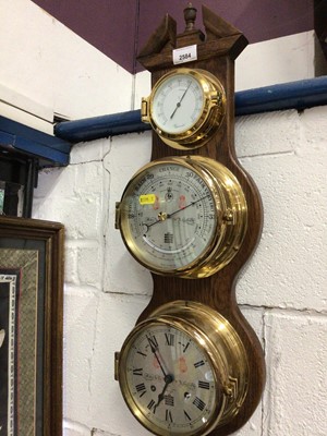 Lot 2584 - Sewills combination hygrometer, barometer and clock mounted on wooden base