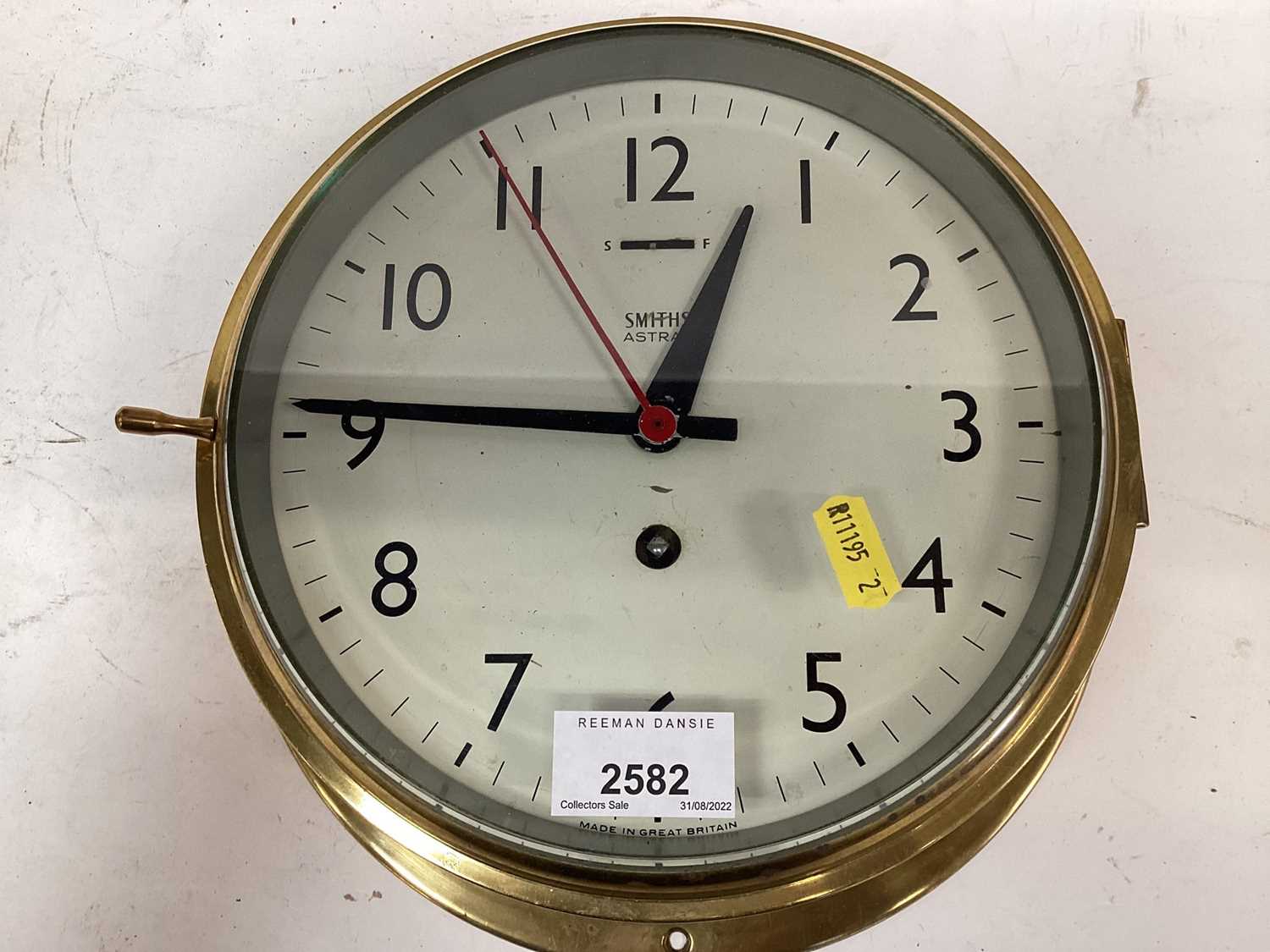 Lot 2582 - Smiths Astral brass cased ships clock