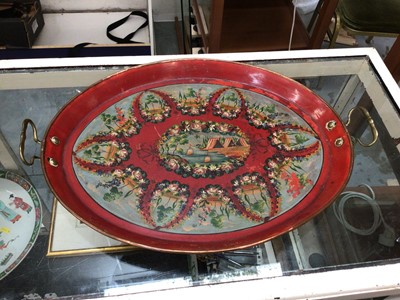 Lot 272 - Victorian toleware tray, the centre painted with boats and tents, surrounded by trees and floral garlands, on a red ground