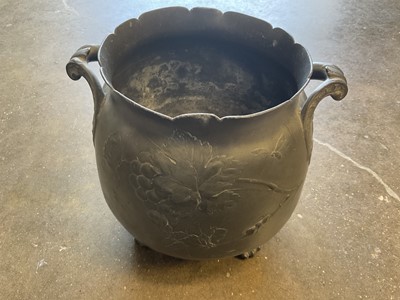 Lot 169 - Art nouveau pewter jardinière, decorated in relief with grapevines, with lion paw feet