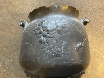 Lot 169 - Art nouveau pewter jardinière, decorated in relief with grapevines, with lion paw feet