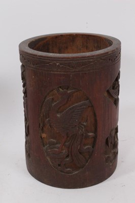 Lot 811 - Good group of Indian and Middle Eastern metalwares, circa 19th century, including vases and bowls, with engraved and relief-form decoration