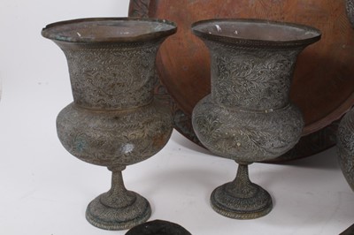Lot 811 - Good group of Indian and Middle Eastern metalwares, circa 19th century, including vases and bowls, with engraved and relief-form decoration