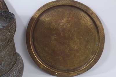 Lot 811 - Good group of Indian and Middle Eastern metalwares, circa 19th century, including vases and bowls, with engraved and relief-form decoration