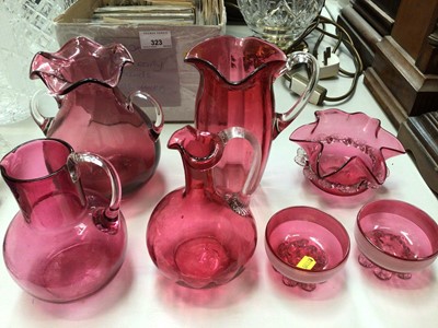 Lot 324 - Group of Victorian and later cranberry glass, including a banded pair of salts