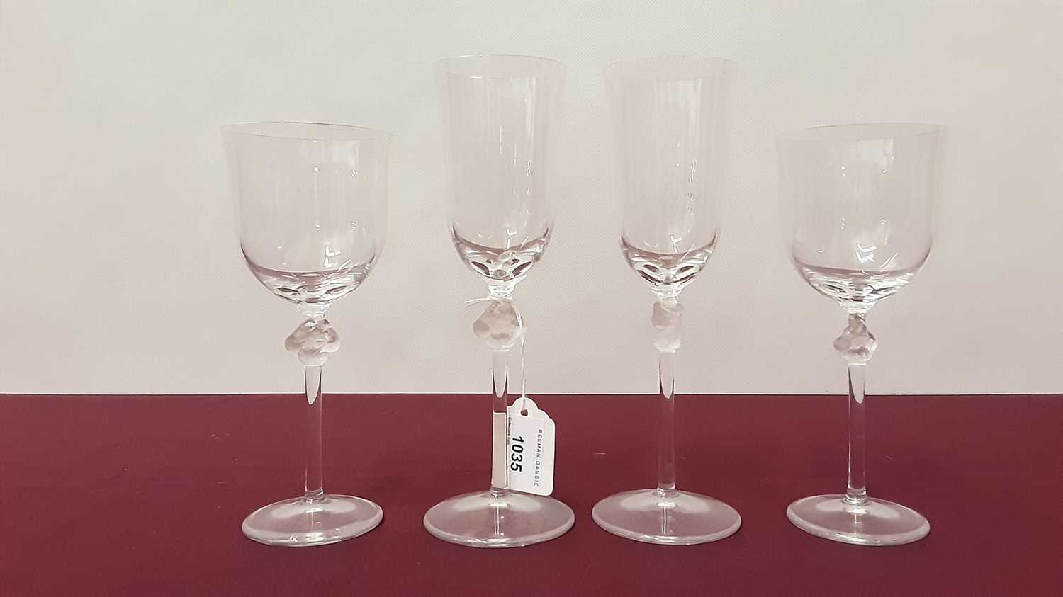 Lot 1035 - Set of four Lalique glasses