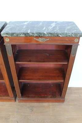 Lot 1330 - Pair of antique Empire style dwarf marble topped mahogany open bookcases