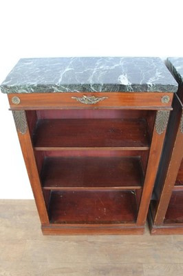 Lot 1330 - Pair of antique Empire style dwarf marble topped mahogany open bookcases