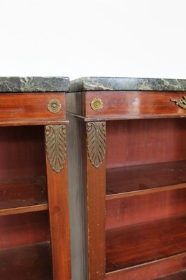 Lot 1330 - Pair of antique Empire style dwarf marble topped mahogany open bookcases