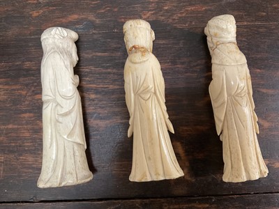 Lot 279 - Three Chinese carved bone figures