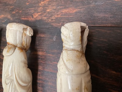 Lot 279 - Three Chinese carved bone figures