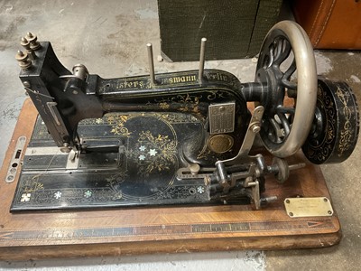 Lot 129 - Two cased sewing machines