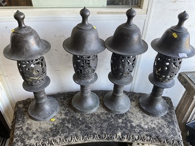 Lot 1305 - Four Chinese patinated brass garden lanterns