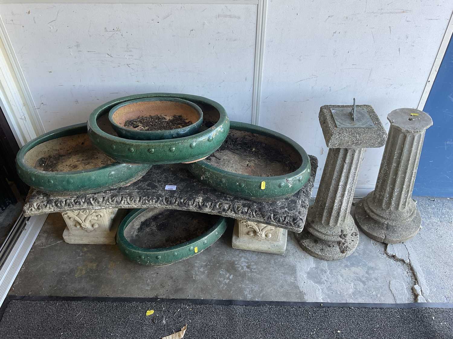 Lot 1306 - Garden sundial on concrete pedestal together with a similar concrete garden pedestal and a concrete garden bench and five green glazed garden planters