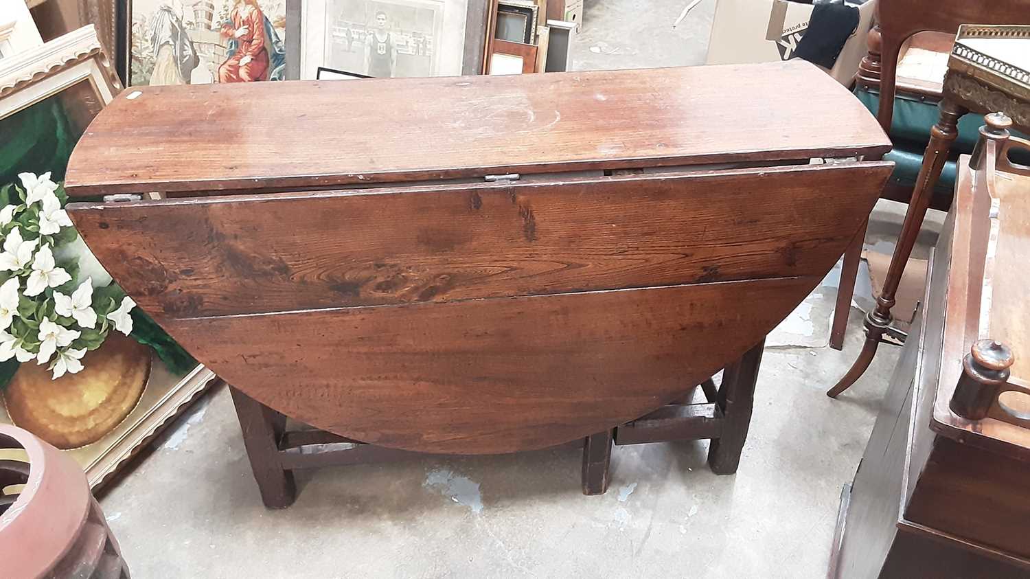 Lot 1165 - Antique oak gateleg oval dining table with end drawer on square chamfered legs joined by stretchers