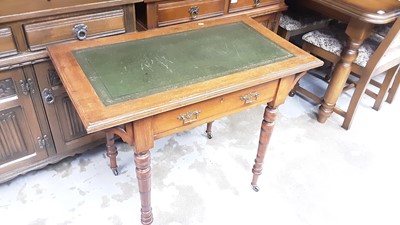 Lot 1146 - Edwardian walnut writing table with inset green leather lined top, single drawer below on ring turned legs, 89cm wide, 50.5cm deep, 71cm high