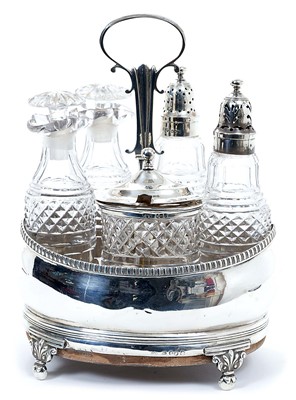 Lot 308 - George III silver five piece cruet of oval form, with gadrooned border, central carrying handle