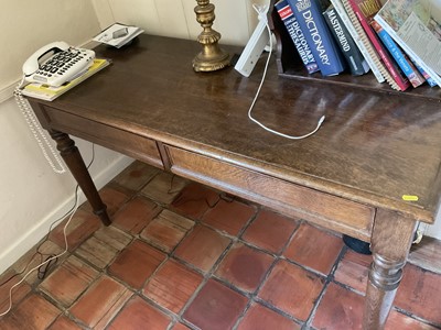 Lot 1415 - Edwardian oak hall table.