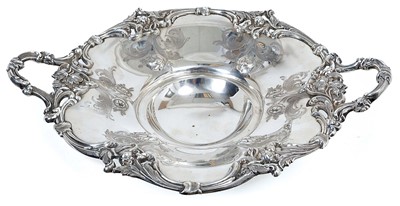 Lot 312 - Victorian silver cake basket of circular form with chased and engraved foliate/scroll decoration