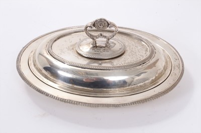 Lot 313 - George V silver entree dish of oval form, with egg and dart borders and separate cover.