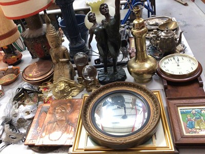 Lot 305 - Eastern brass table lamp, figural lamp, gilt wood praying Buddha ornament, copper warming pan signed J. Dillon, two clear glass balls, round convex gilt framed wall mirror, pictures, clock and othe...