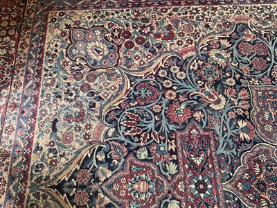 Lot 1485 - Heriz carpet with central foliate medallion.