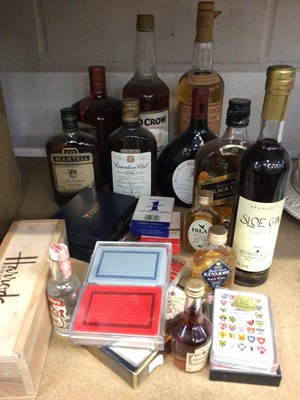 Lot 122 - Group of bottles of alcohol, including Glenmorangie single malt whisky, Old Crow Bourbon, Cointreau, Canadian Club, etc, together with a quantity of playing cards