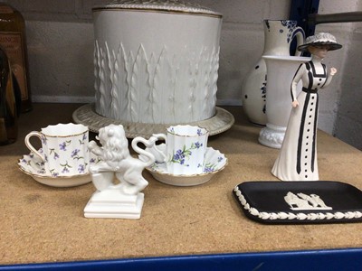 Lot 123 - Group of ceramics, including a Victorian cheese dome, Royal Worcester and Copeland cups and saucers, Nymphenburg lion, Wedgwood figure, etc
